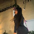 Claudia Romani – Dazzles in a low-cut black dress at Casadonna in Miami - 454 x 658