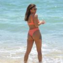 Kayleigh Morris – In orange bikini on the beach in Cyprus - 454 x 512