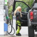 Avril Lavigne – Seen while refueling her truck at a gas station in Malibu