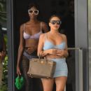 Larsa Pippen – With Kiki Barthlook in bikinis as they sit by the pool in Miami - 454 x 681