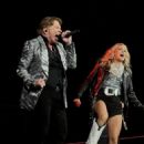 Last night (March 13, 2023), Axl joined Carrie Underwood on stage for his show at Crypto.com Arena in Los Angeles, CA - 454 x 807