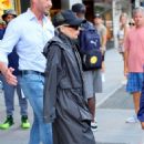 Lady Gaga – In a black trench coat and jeans while out in New York