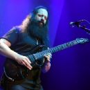 John Petrucci performs as part of the G3 concert tour at Brooklyn Bowl Las Vegas at The Linq Promenade on January 17, 2018 in Las Vegas, Nevada - 454 x 344