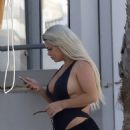 Bianca Gascoigne – Seen in a black swimsuit at Ibiza’s Cala de Bou beach - 454 x 569