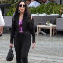 Cher is seen out for a walk with friends in the Italian resort of Portofino