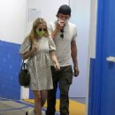 Emma Roberts in Mini Dress and Garrett Hedlund – Go for a check up in Los Angeles - 454 x 568