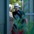 Pamela Anderson was seen kissing husband Rick Salomon on Wednesday July 16, 2014 in Malibu, just 1 week after it was announced she had filed for divorce - 454 x 362