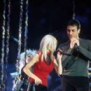 Christina Aguilera and Enrique Iglesias perform during the halftime show at Super Bowl XXXIV (2000) - 403 x 612