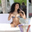Draya Michele – In bikini on the beach in Cancun - 454 x 303