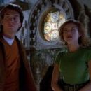 Kari Wuhrer as Capt. Maggie Beckett in Sliders - 454 x 255