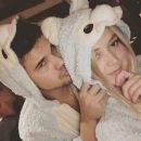 Billie Catherine Lourd and Taylor Lautner