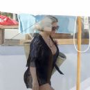 Bianca Gascoigne – Seen in a black swimsuit at Ibiza’s Cala de Bou beach - 454 x 597