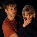 Emilie De Ravin is Claire and Dominic Monaghan is Charlie on Lost. - 427 x 640
