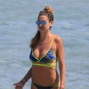 Melissa Satta – Bikini candids at the beach in Ibiza