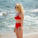 Claudia Lee in Red Bikini at the beach in Cancun - 454 x 303