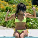 Roxanne Pallett in Yellow Bikini at a pool in Spain