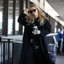 Kathryn Newton – Catches a flight at LAX in Los Angeles - 454 x 681