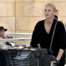 Sarah Murdoch – Arriving at Sydney International Airport - 454 x 324