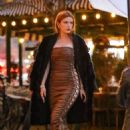 Bella Thorne &#8211; In a long brown satin dress out in New York