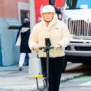 Deborra-Lee Furness – Riding an electric scooter through New York - 454 x 683