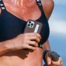 Gisele Bundchen – Out for a jog with her dog in Costa Rica