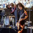 Jimmy Page performing at the Day on the Green at Oakland–Alameda County Coliseum in Oakland on July 23, 1977 - 454 x 702