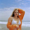 Iskra Lawrence – Beach photoshoot for her Saltair Skin Care Products - 454 x 685