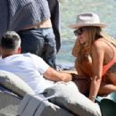 Laura Anderson – Seen in a coral swimsuit in Mykonos - 454 x 303