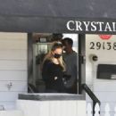 Avril Lavigne – With face mask stop at a Crystals store in Malibu with friends