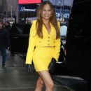 Chrissy Teigen – Wearing yellow mini-dress at Good Morning America show in New York