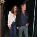 Cindy Crawford looks ultra-chic in a satin top and blazer as she heads out for a romantic dinner with husband Rande Gerber in Santa Monica - 454 x 681
