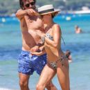 Sylvie Meis – Bikini candids at the beach in Saint Tropez - 454 x 681