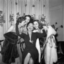 Dominican actress Maria Montez (C) poses with actress Claire Duhamel (L) and sisters Teresita and Adita, on January 24, 1951 at the Edouard VII Theater in Paris after the performance of the play "L'île heureuse", written by her husband French actor Jean-P