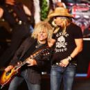 Bret Michaels performs with the cast of 