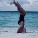 Ilary Blasi in Swimsuit – Doing yoga at the Maldives - 454 x 577