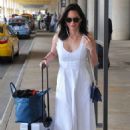 Olivia Munn in Zeynep Arçay Dress : at Airport in Washington