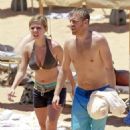 Jennette McCurdy wearing a pretty bikini and board shorts was spotted kayaking with a male friend in Maui