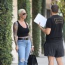 Amber Rose – Wearing blue denim jeans while out in West Hollywood
