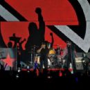 Tom Morello of Prophets of Rage performs onstage during KROQ Almost Acoustic Christmas 2017 at The Forum on December 9, 2017 in Inglewood, California - 454 x 298