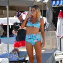 Sophie Monk in Blue Bikini on a beach in Portofino