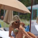 Melissa Castagnoli – In a beige bikini at the beach in Miami