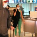 Olivia Culpo &#8211; Spotted at LAX in a lime green yoga outfit in Los Angeles