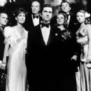 Some of the cast of The Last Tycoon. From left to right: Tony Curtis, Leslie Curtis, Ray Milland, Robert De Niro, Jeanne Moreau, Robert Mitchum, and Theresa Russell