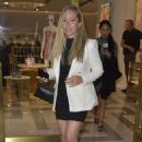 Kendra Wilkinson – In a black mini skirt shopping at Versace in Beverly Hills - 454 x 671