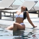 Natalie Nunn in White Bikini at a pool in Spain - 454 x 516