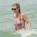 Baskin Champion in Purple Bikini at the beach in Miami - 454 x 462