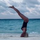 Ilary Blasi in Swimsuit – Doing yoga at the Maldives - 454 x 606