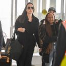 Angelina Jolie &#8211; With Zahara Jolie-Pitt arriving at JFK Airport in New York