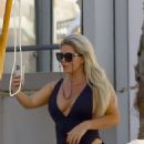 Bianca Gascoigne – Seen in a black swimsuit at Ibiza’s Cala de Bou beach - 454 x 564
