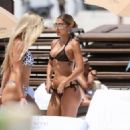 Karrueche Tran – With Chantel Jeffries in a bikinis on the beach in Miami - 454 x 324